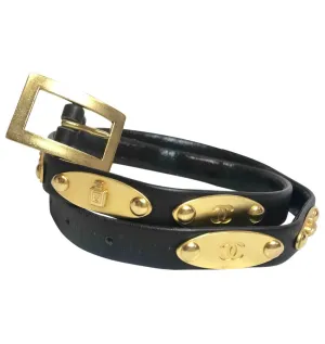Vintage CHANEL black belt with golden buckle and iconic logo motifs, CC mark, camellia flower, turtle, perfume, clover. R0410113